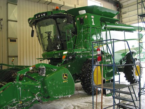Canstar Community News June 25, 2018 - Washing large farm machinery is one of the services at Enns Brothers in Portage la Prairie. (ANDREA GEARY/CANSTASR COMMUNITY NEWS)