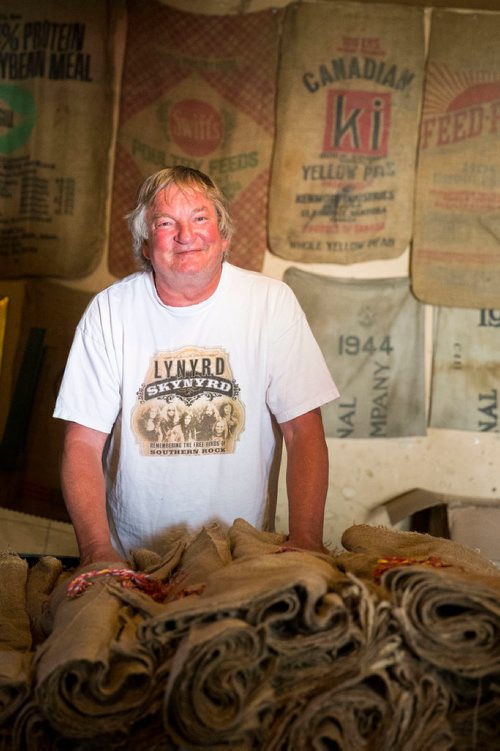 MIKAELA MACKENZIE / WINNIPEG FREE PRESS
David Harder , St Boniface Bag Co owner, poses in his shop among the many wares (including sandbags, jute bags, one-ton tote bags, rolls of burlap, and many other products) in Winnipeg on Thursday, July 5, 2018. The company has been up and running since 1949, and in Harder's family since 1951.
Mikaela MacKenzie / Winnipeg Free Press 2018.