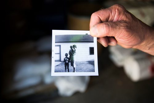 MIKAELA MACKENZIE / WINNIPEG FREE PRESS
David Harder, St Boniface Bag Co owner, shows family photos in front of the old shop in Winnipeg on Thursday, July 5, 2018. The company has been up and running since 1949, and in Harder's family since 1951.
Mikaela MacKenzie / Winnipeg Free Press 2018.