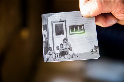 MIKAELA MACKENZIE / WINNIPEG FREE PRESS
David Harder, St Boniface Bag Co owner, shows family photos in front of the old shop in Winnipeg on Thursday, July 5, 2018. The company has been up and running since 1949, and in Harder's family since 1951.
Mikaela MacKenzie / Winnipeg Free Press 2018.