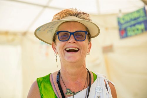 MIKAELA MACKENZIE / WINNIPEG FREE PRESS
Donna Mills, volunteer at the InfOasis, at the information point's tent at the Winnipeg Folk Fest in Bird's Hill Provincial Park on Friday, July 6, 2018. 
Mikaela MacKenzie / Winnipeg Free Press 2018.