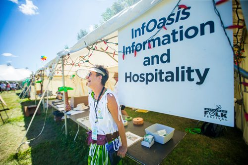 MIKAELA MACKENZIE / WINNIPEG FREE PRESS
Donna Mills, volunteer at the InfOasis, at the information point's tent at the Winnipeg Folk Fest in Bird's Hill Provincial Park on Friday, July 6, 2018. 
Mikaela MacKenzie / Winnipeg Free Press 2018.