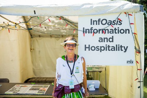 MIKAELA MACKENZIE / WINNIPEG FREE PRESS
Donna Mills, volunteer at the InfOasis, at the information point's tent at the Winnipeg Folk Fest in Bird's Hill Provincial Park on Friday, July 6, 2018. 
Mikaela MacKenzie / Winnipeg Free Press 2018.