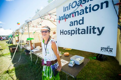 MIKAELA MACKENZIE / WINNIPEG FREE PRESS
Donna Mills, volunteer at the InfOasis, at the information point's tent at the Winnipeg Folk Fest in Bird's Hill Provincial Park on Friday, July 6, 2018. 
Mikaela MacKenzie / Winnipeg Free Press 2018.