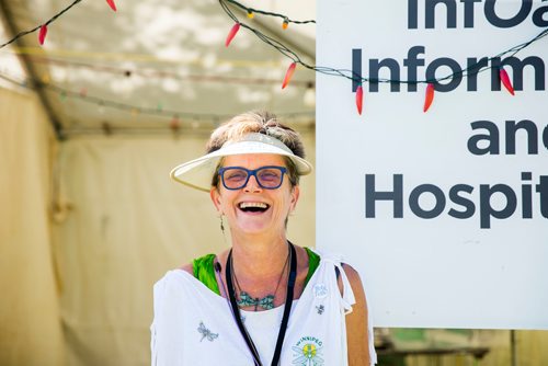 MIKAELA MACKENZIE / WINNIPEG FREE PRESS
Donna Mills, volunteer at the InfOasis, at the information point's tent at the Winnipeg Folk Fest in Bird's Hill Provincial Park on Friday, July 6, 2018. 
Mikaela MacKenzie / Winnipeg Free Press 2018.