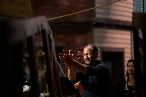 ANDREW RYAN / WINNIPEG FREE PRESS The Winnipeg Symphony Orchestra conductor Julian Pellicano, directs a concert consisting of music related to water, by great composers such as George Frideric Handel, on the Nonsuch replica at the Manitoba Museum on July 4, 2018.