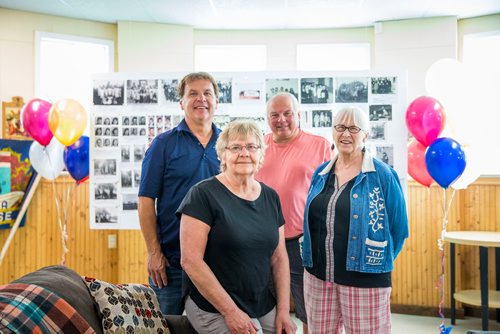 MIKAELA MACKENZIE / WINNIPEG FREE PRESS
Gordon Onsowich (left), Virginia Matkowski, Gerry Palidwor, and Kathy Slota (all former students at the schools) pose for a photo while setting up for the reunion of four former one-room school houses in the area (Zora School, Melrose East, Melrose West, and Cook's Creek) at the Immaculate Conception Church of Cooks Creek on Friday, July 6, 2018. 
Mikaela MacKenzie / Winnipeg Free Press 2018.