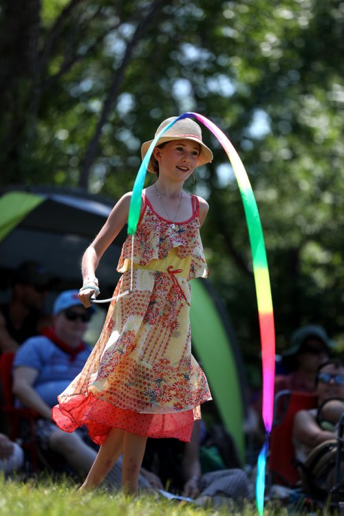 RUTH BONNEVILLE / WINNIPEG FREE PRESS


Emma Maksymchuk (9yrs), swirls her colourful baton around while attending the Winnipeg Folk Fest with her family at Birds Hill Park Saturday.

July 07, 2018 
