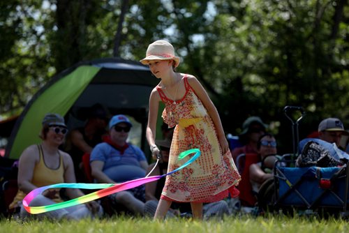 RUTH BONNEVILLE / WINNIPEG FREE PRESS


Emma Maksymchuk (9yrs), swirls her colourful baton around while attending the Winnipeg Folk Fest with her family at Birds Hill Park Saturday.

July 07, 2018 
