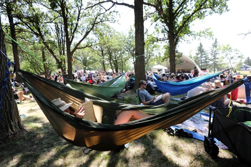 RUTH BONNEVILLE / WINNIPEG FREE PRESS


People lay in hammocks reading under clusters of trees to keep cool while attending the Winnipeg Folk Fest at Birds Hill Park Saturday.

July 07, 2018 
