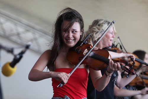 RUTH BONNEVILLE / WINNIPEG FREE PRESS


Martha Pitre plays the fiddle in the band, Lumber Jills from Moncton NB,  on stage at the Winnipeg Folk Fest at Birds Hill Park Saturday.  

July 07, 2018 
