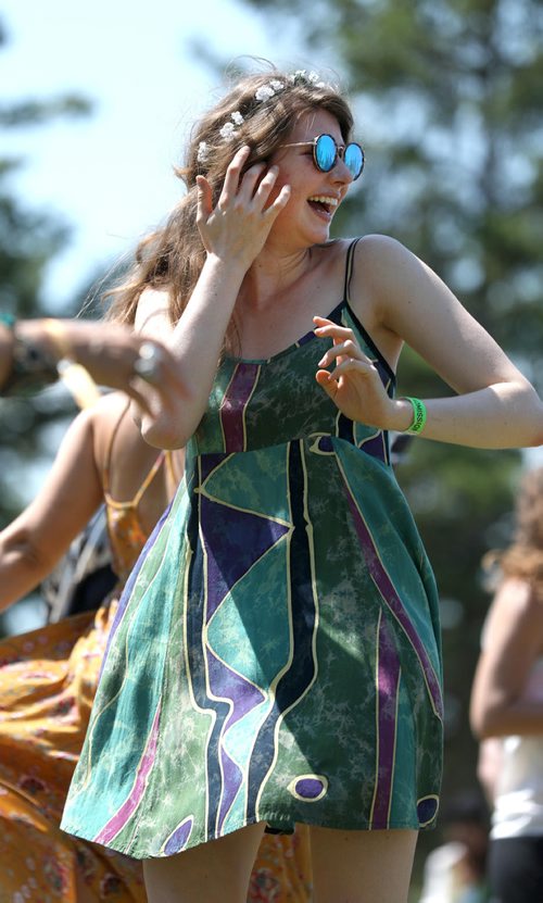 RUTH BONNEVILLE / WINNIPEG FREE PRESS


Julie Thiessen is all smiles as she dances with her friend at Birds Hill Park Saturday.

July 07, 2018 
