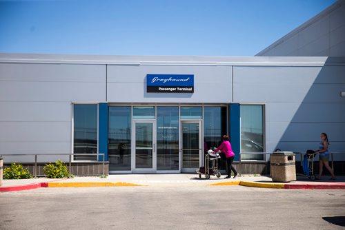 MIKAELA MACKENZIE / WINNIPEG FREE PRESS
Barbara Pawluck (left) and Wynter Payjack (12), who came from Prince George by air and are headed for Neepawa later today take a turn around the parking lot for a Global news camera at the Greyhound bus terminal in Winnipeg on Monday, July 9, 2018. Greyhound is cutting all of their prairie services this October.
Mikaela MacKenzie / Winnipeg Free Press 2018.