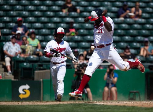 ANDREW RYAN / WINNIPEG FREE PRESS Abercrombie scores the Goldeyes first run of the afternoon in Goldeyes game action against the Sioux Lookout Canaries on July 10, 2018.