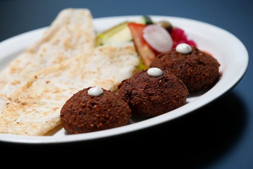JOHN WOODS / WINNIPEG FREE PRESS
Stuffed Falafel - Made from ground chickpeas. parsley and cumin, stuffed with a mixture of tomatoes, red peppers. Served with pita bread at Ali Baba restaurant photographed in Winnipeg Tuesday, July 10, 2018.

