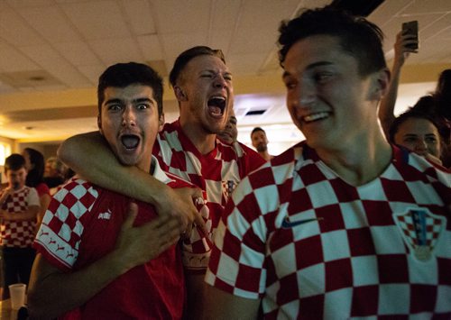ANDREW RYAN / WINNIPEG FREE PRESS Anton Lulic, left, celebrates after Croatia scored its second half goal against England tying the semi final World Cup game. Croation fans gathered at the Creation Church on Main St. on July 11, 2018.