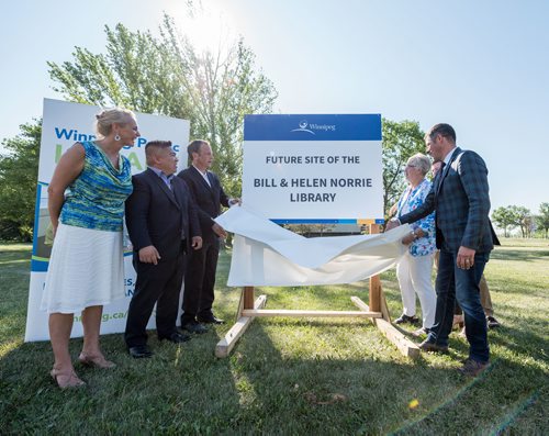 DAVID LIPNOWSKI / WINNIPEG FREE PRESS

A sign is unveiled during the official unveiling of the location of the future River Heights Library, renamed the Bill & Helen Norrie Library Friday July 13, 2018.
(l-r) Director of Community Services Cindy Fernandes, Councillor Mike Pagtakhan, Councillor John Orlikow, Helen Norrie, Mayor Brian Bowman.