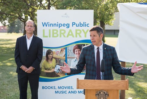 DAVID LIPNOWSKI / WINNIPEG FREE PRESS

Mayor Brian Bowman (right) speaks as Councillor John Orlikow, River Heights-Fort Garry Ward listens during the official unveiling of the location of the future River Heights Library, renamed the Bill & Helen Norrie Library Friday July 13, 2018.