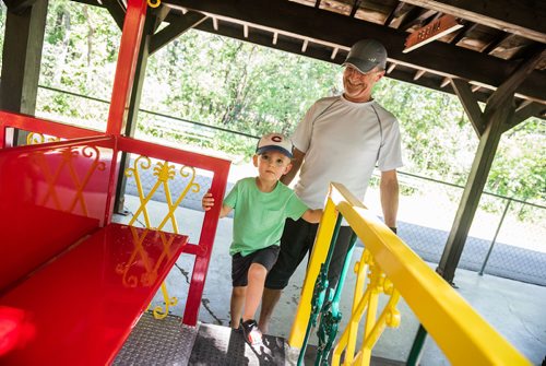 DAVID LIPNOWSKI / WINNIPEG FREE PRESS

Brady (age 2.5) and grandfather Len Rolfson are the first passengers on the Assiniboine Park Railroad Friday July 13, 2018.