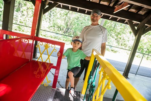 DAVID LIPNOWSKI / WINNIPEG FREE PRESS

Brady (age 2.5) and grandfather Len Rolfson are the first passengers on the Assiniboine Park Railroad Friday July 13, 2018.