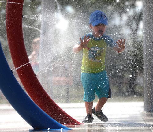 RUTH BONNEVILLE / WINNIPEG FREE PRESS

RJ Mader (3yrs) cools himself  at The Gateway Recreation Centre spray pad in the scorching heat Friday.  
Standup photo 


July 13, 2018 

