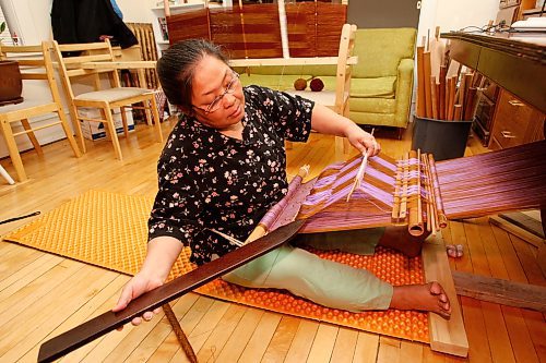 BORIS MINKEVICH / WINNIPEG FREE PRESS 090126 Kay Seng is a Karen Refugee from Burma that makes traditional clothing in her Winnipeg apartment.