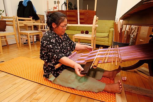 BORIS MINKEVICH / WINNIPEG FREE PRESS 090126 Kay Seng is a Karen Refugee from Burma that makes traditional clothing in her Winnipeg apartment.