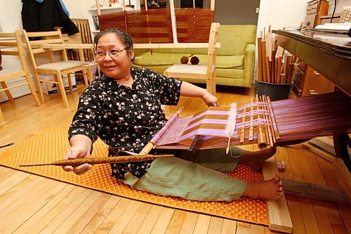 BORIS MINKEVICH / WINNIPEG FREE PRESS 090126 Kay Seng is a Karen Refugee from Burma that makes traditional clothing in her Winnipeg apartment.