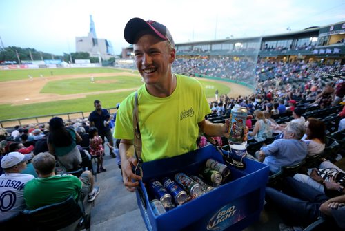 TREVOR HAGAN / WINNIPEG FREE PRESS
Jakob Sanderson, 21, selling beer during the Winnipeg Goldeyes game, Friday, July 13, 2018. 24hourproject