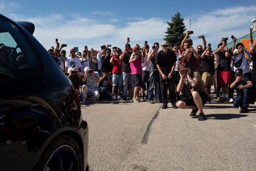 ANDREW RYAN / WINNIPEG FREE PRESS  A crowd winces at the sheer volume of a Honda civiv which won the exhaust competition, where competitors compete for the loudest car at the Driven car festival on July 14, 2018.