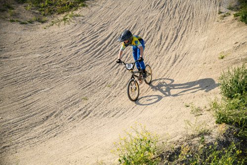 Mike Sudoma / Winnipeg Free Press
Kaiden Kacalek rounds turn two during Friday nights race at Destination X BMX Park in Lorette, MB" July 13, 2018