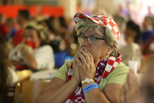 TREVOR HAGAN / WINNIPEG FREE PRESS
In the basement of the St. Nicholas Tavelich Croatian Parish of the Roman Catholic Archdiocese of Winnipeg, Croatian fans watch as their team trails France, 2-1 during the first half of the World Cup Final, Sunday, July 15, 2018.