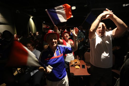 TREVOR HAGAN / WINNIPEG FREE PRESS
French fans at the Franco Manitoban Cultural Centre celebrate as their team wins the World Cup Final, Sunday, July 15, 2018.