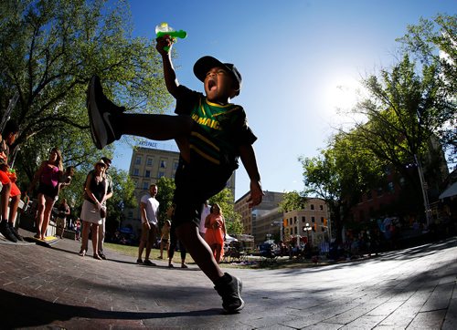 JOHN WOODS / WINNIPEG FREE PRESS
Janoah Stephen dances at the Soca-Raggae Festival in Old Market Square in Winnipeg Sunday, July 15, 2018.

