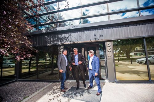 MIKAELA MACKENZIE / WINNIPEG FREE PRESS
Conservative MP  James Bezan (left), former conservative MP Lawrence Toet, and conservative MP Randy Hoback walk out the front doors of the Magellan Aerospace building for a portrait in Winnipeg on Monday, July 16, 2018. 
Mikaela MacKenzie / Winnipeg Free Press 2018.