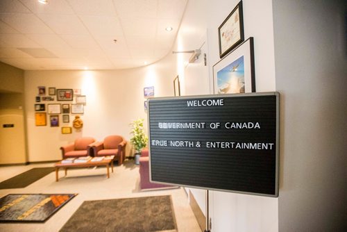 MIKAELA MACKENZIE / WINNIPEG FREE PRESS
A sign in the Magellan Aerospace lobby welcomes Conservative MPs in Winnipeg on Monday, July 16, 2018. 
Mikaela MacKenzie / Winnipeg Free Press 2018.