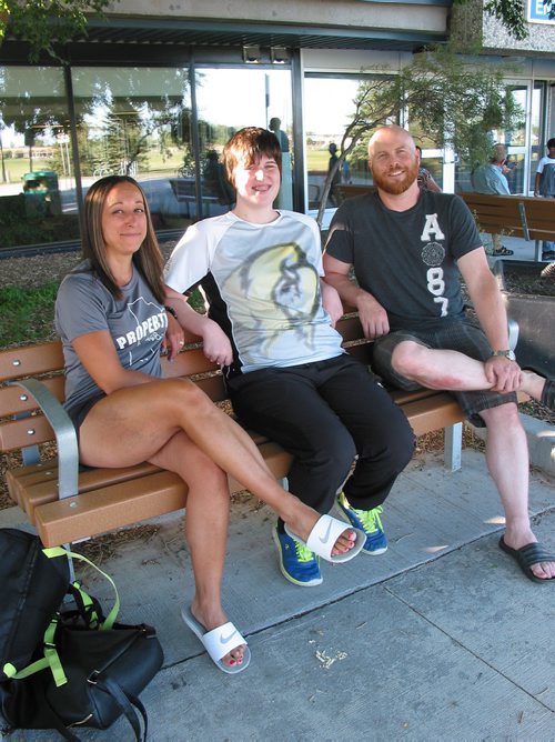 Canstar Community News July 9, 2018 - (From left) Special Olympics swim coach Melissa Diamond, athlete Quinlan Roberts from La Salle, and Quinlan's father Chad Roberts are shown outside the Pan Am Pool where Quinlan is training for swimming competition in the national Special Olympics later this month in Nova Scotia. (ANDREA GEARY/CANSTAR COMMUNITY NEWS)