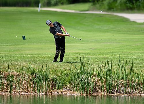 ANDREW RYAN / WINNIPEG FREE PRESS Devon Schade hits a ball from the last fair way at Quarry Oaks golf course in Steinbach on July 16, 2018. Schade finished the day at the Manitoba Men's Amateur Championship six strokes over par.