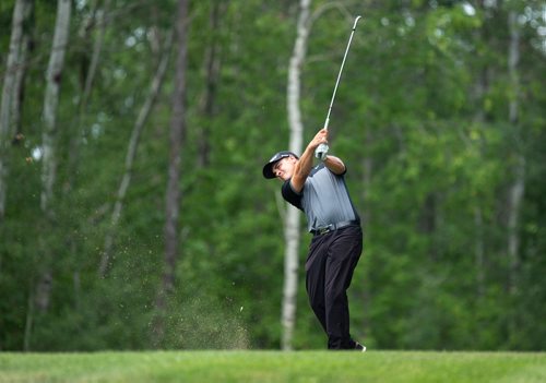 ANDREW RYAN / WINNIPEG FREE PRESS  Devon Schade hits a ball from the last tee off at Quarry Oaks golf course in Steinbach on July 16, 2018. Schade finished the day at the Manitoba Men's Amateur Championship six strokes over par.