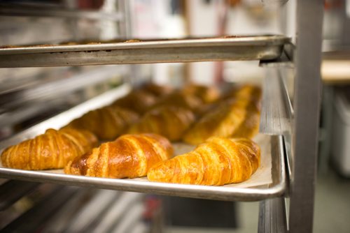 MIKAELA MACKENZIE / WINNIPEG FREE PRESS
Croissants cool at Pennyloaf bakery in Winnipeg on Friday, July 13, 2018. 24hourproject
Mikaela MacKenzie / Winnipeg Free Press 2018.