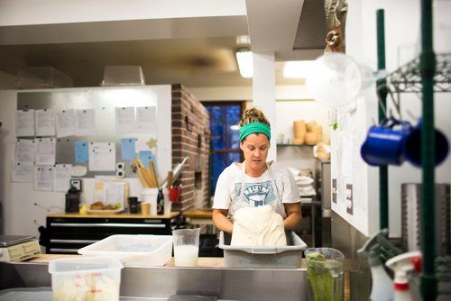 MIKAELA MACKENZIE / WINNIPEG FREE PRESS
Owner Suzanne Gessler turns the bread dough at Pennyloaf bakery in Winnipeg on Friday, July 13, 2018. 24hourproject
Mikaela MacKenzie / Winnipeg Free Press 2018.