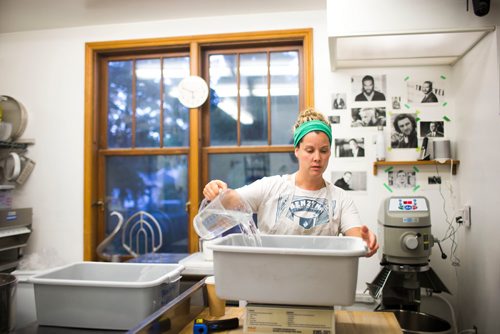 MIKAELA MACKENZIE / WINNIPEG FREE PRESS
Owner Suzanne Gessler mixes fresh bread dough at Pennyloaf bakery in Winnipeg on Friday, July 13, 2018. 24hourproject
Mikaela MacKenzie / Winnipeg Free Press 2018.