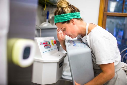 MIKAELA MACKENZIE / WINNIPEG FREE PRESS
Owner Suzanne Gessler mixes fresh bread dough at Pennyloaf bakery in Winnipeg on Friday, July 13, 2018. 24hourproject
Mikaela MacKenzie / Winnipeg Free Press 2018.