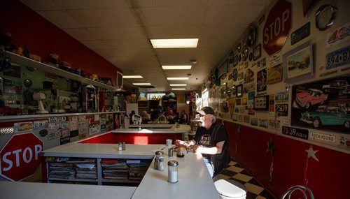 MIKE DEAL / WINNIPEG FREE PRESS
Siggi Klann digs into his food early in the morning before the breakfast crowd arrives at Big Ricks Hot Rod Diner, 379 Henderson.
180713 - Friday, July 13, 2018.
24hourproject