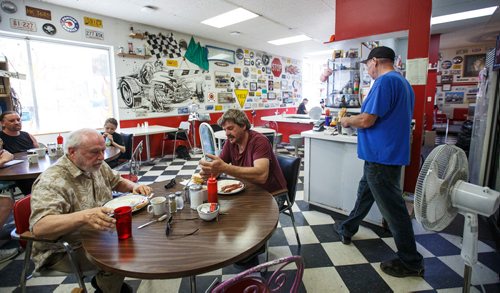 MIKE DEAL / WINNIPEG FREE PRESS
Owner Rick Wareham (right) rings up an order while regulars get into their breakfast shortly after opening at 8 am.
The early morning breakfast crowd at Big Ricks Hot Rod Diner, 379 Henderson.
180713 - Friday, July 13, 2018.
24hourproject