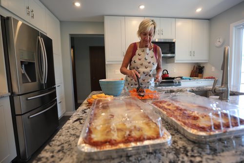 RUTH BONNEVILLE / WINNIPEG FREE PRESS

Feature Project on Food for Thought, 24hourproject  

Description: Cooking for others in need. 


Sandi Enns prepares lasagna dishes in her kitchen for people who need love and support Friday.  

See story by Carl Degurse 

July 13, 2018 

