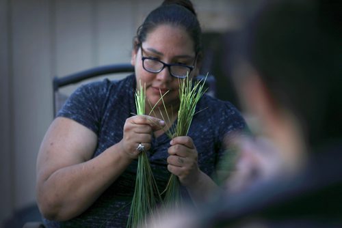 RUTH BONNEVILLE / WINNIPEG FREE PRESS

Feature Project on Food for Thought, 24hourproject  
Description:11 am / service  North West Community Food Centre  785  Keewatin / Jill Wilson story.

Members of the Indigenous community harvest and prep ceremonial sweetgrass from their garden at the centre by separating each strand  and braiding them Friday.  

Photo of Adriana Brydon braiding sweetgrass in garden area of North West Community Food Centre Friday. 



July 13, 2018 

