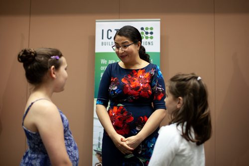 ANDREW RYAN / WINNIPEG FREE PRESS  Honourable Maryam Monsef, Minister of Status of Women, speaks to ten year old Helen Brown, left, who wants to pursue a career in coding and her younger sister Grace, 8, who would like to be a pilot. On July 17, the minister announced the federal governments new funding to encourage young women to enter the field of information and communications technology.