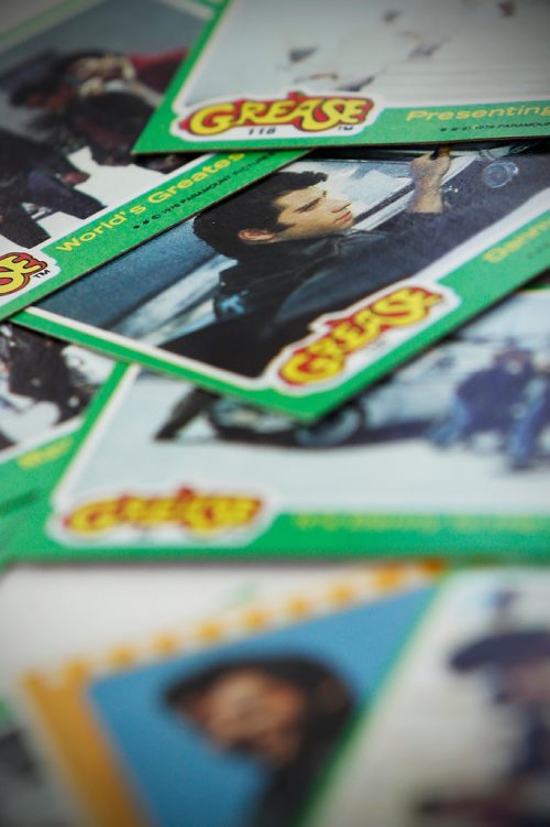 JOHN WOODS / WINNIPEG FREE PRESS
Joanne Kelly looks through some Grease collector cards which she used to collect when she was nine in Winnipeg Tuesday, July 17, 2018. The 40th anniversary of the release of the film is coming up.