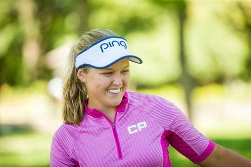 MIKAELA MACKENZIE / WINNIPEG FREE PRESS
Five-time LPGA tournament winner Brooke Henderson poses for pictures and signs autographs for kids in  the Future Pros Program at the St. Charles Country Club in Winnipeg on Tuesday, July 17, 2018. 
Mikaela MacKenzie / Winnipeg Free Press 2018.